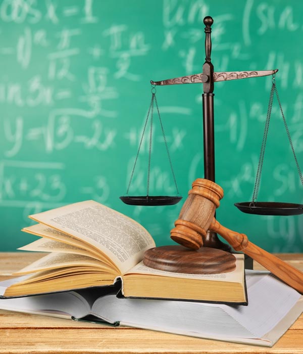 Scales and gavel on top of legal books